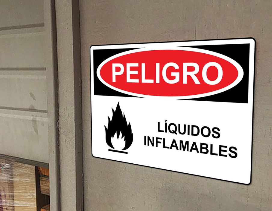 Spanish OSHA DANGER Flammable Liquids Sign With Symbol