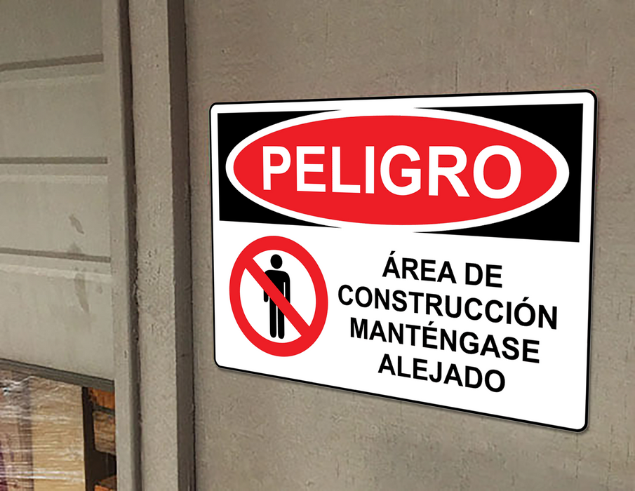 Spanish OSHA DANGER Construction Site No Trespassing Sign With Symbol