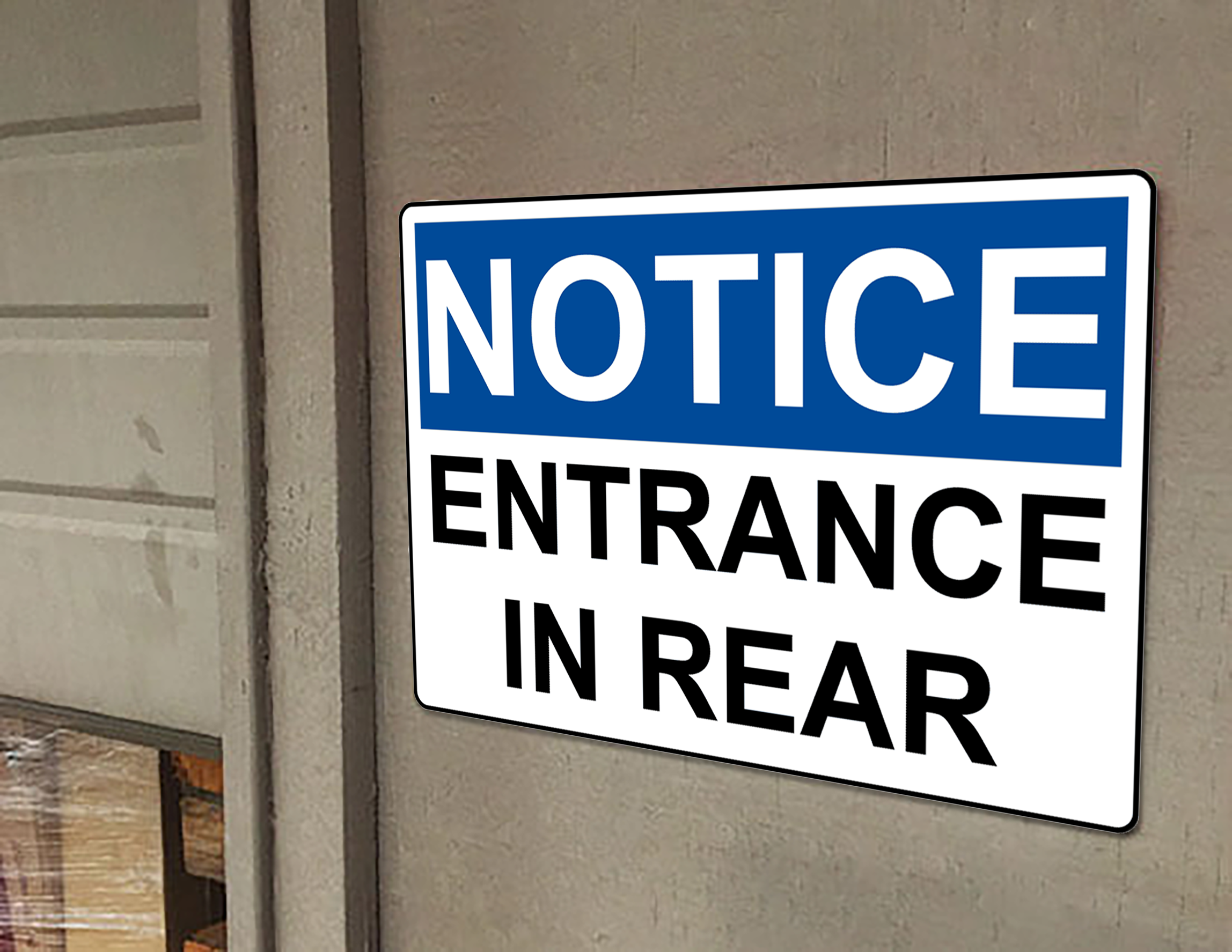 AVISO DE OSHA Entrada por la Parte Trasera Letrero